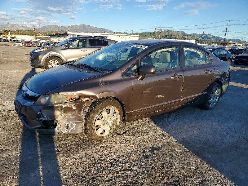 HONDA CIVIC LX 2011 with VIN 2HGFA1F58BH523069 - Photo from auction