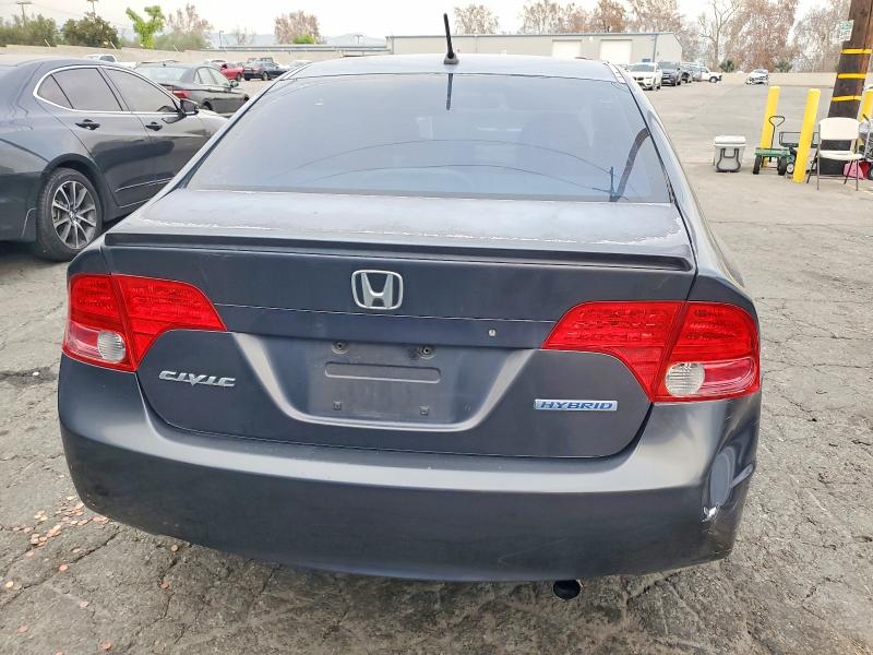 Photo 6 from auction – 2007 HONDA CIVIC HYBR with VIN JHMFA36297S025090