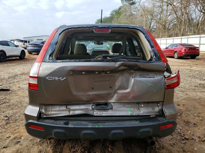 Photo 6 from auction – 2009 HONDA CRV with VIN 5J6RE38729L018064