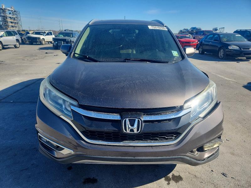 Photo 5 from auction – 2016 HONDA CR-V with VIN 2HKRM3H77GH508669