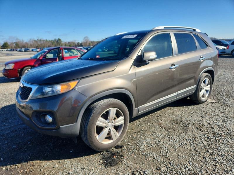 KIA SORENTO EX 2013 with VIN 5XYKU4A67DG415906 - Photo from auction