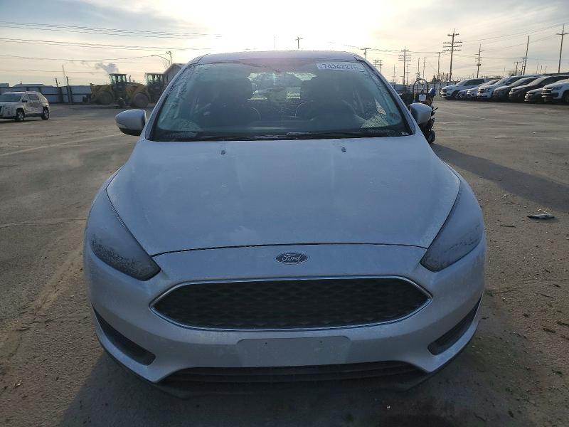 Foto 5 de la subasta – 2017 FORD FOCUS SE con VIN 1FADP3K23HL210766