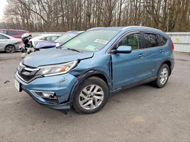 HONDA CR-V 2015 with VIN 5J6RM4H73FL050042 - Photo from auction