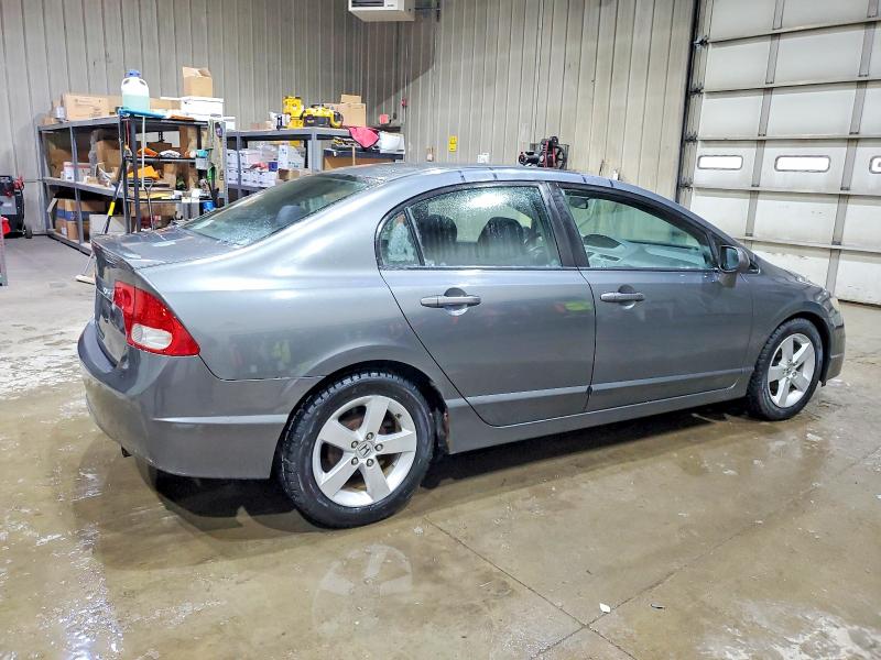 Photo 3 from auction – 2011 HONDA CIVIC LX-S with VIN 19XFA1F65BE034308