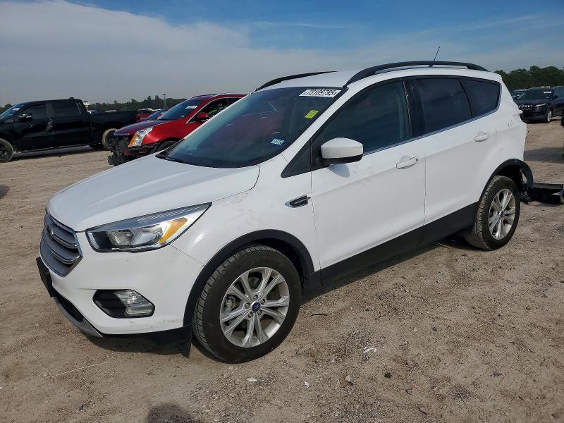 FORD ESCAPE 2018 with VIN 1FMCU0GD6JUD43718 - Photo from auction