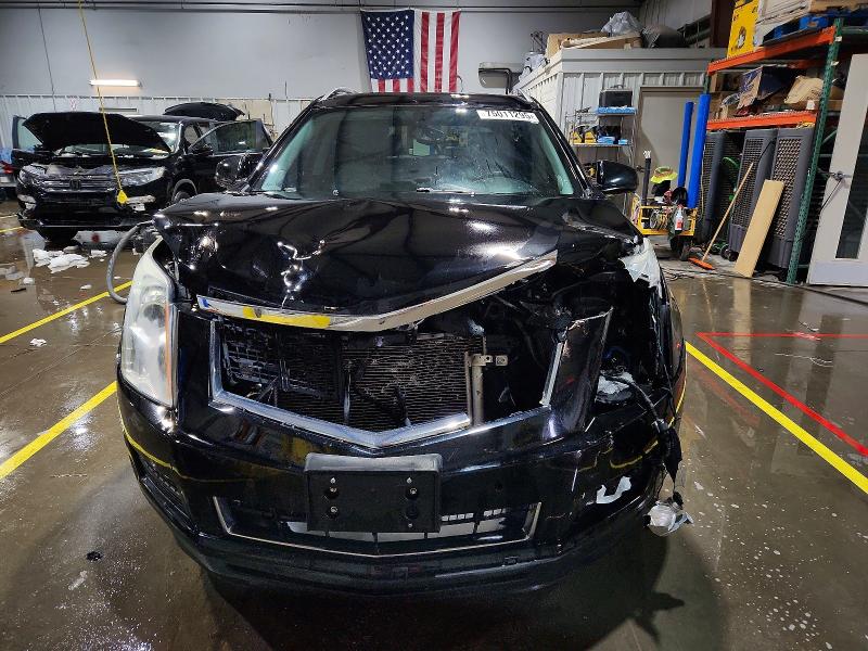 Photo 5 from auction – 2014 CADILLAC SRX LUXURY with VIN 3GYFNBE37ES687207