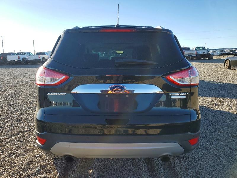 Photo 6 from auction – 2016 FORD ESCAPE with VIN 1FMCU0J97GUB71521