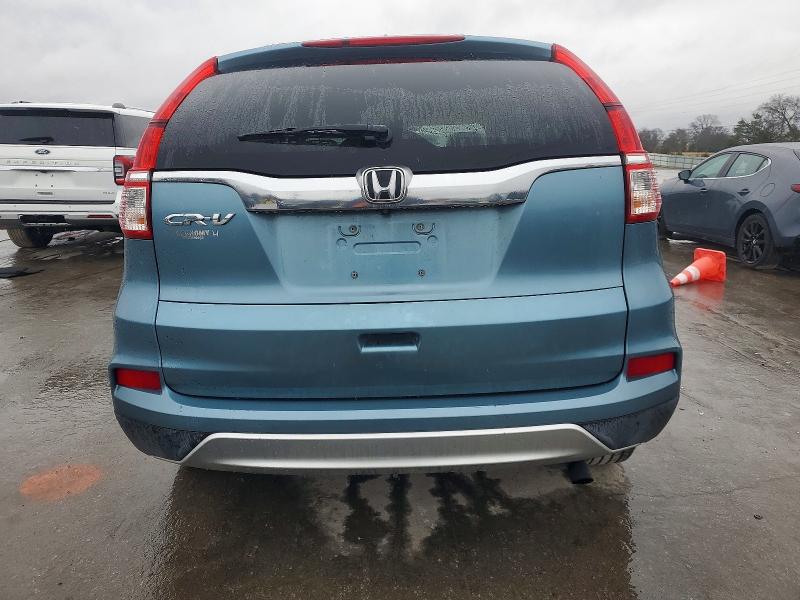 Photo 6 from auction – 2016 HONDA CR-V with VIN 2HKRM3H54GH515142