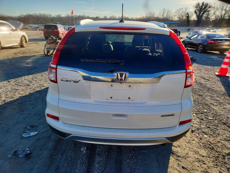 Photo 6 from auction – 2015 HONDA CR-V TOURI with VIN 5J6RM3H94FL020446