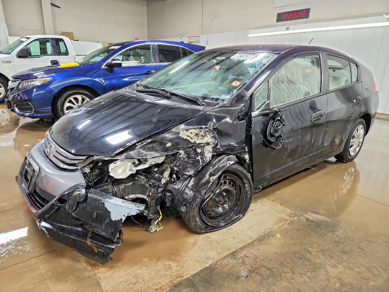 HONDA INSIGHT LX 2010 with VIN JHMZE2H50AS011864 - Photo from auction