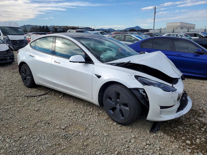 Photo 4 from auction – 2021 TESLA MODEL 3 with VIN 5YJ3E1EA5MF871862