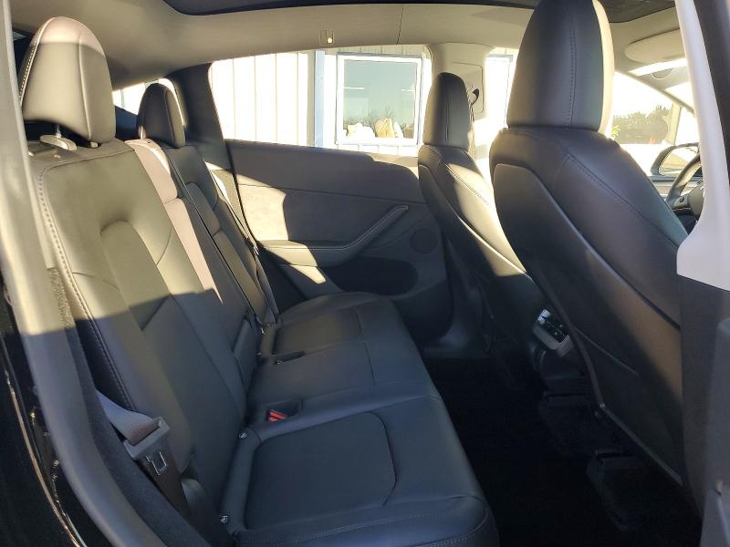 Photo 11 from auction – 2024 TESLA MODEL Y with VIN 7SAYGDEE9RA225591