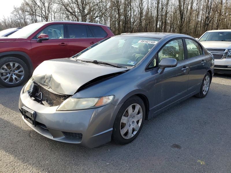 HONDA CIVIC LX 2010 with VIN 19XFA1F53AE063554 - Photo from auction