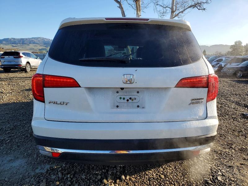 Foto 6 de la subasta – 2016 HONDA PILOT TOUR con VIN 5FNYF6H91GB076930