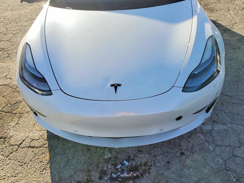 Photo 11 from auction – 2022 TESLA MODEL 3 with VIN 5YJ3E1EB4NF275801