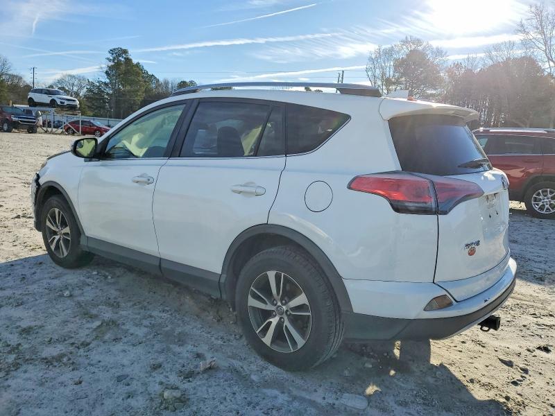 Photo 2 from auction – 2017 TOYOTA RAV4 XLE with VIN JTMRFREV6HJ703896