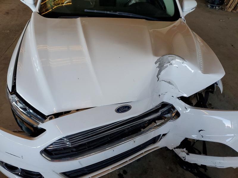 Photo 11 from auction – 2015 FORD FUSION with VIN 3FA6P0RU4FR105795