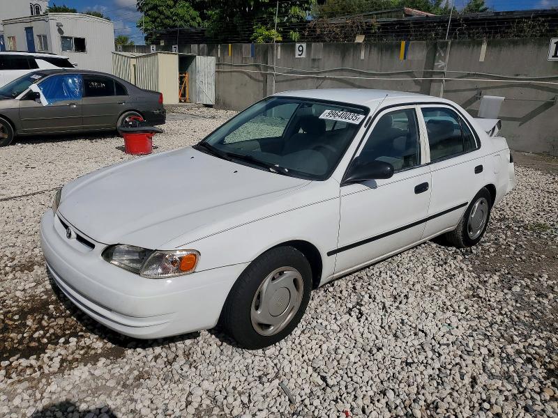 TOYOTA COROLLA 2000 with VIN 2T1BR12E5YC302592 - Photo from auction