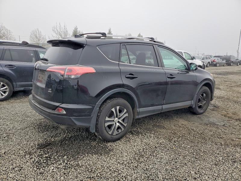 Photo 3 from auction – 2018 TOYOTA RAV4 LE with VIN 2T3BFREV7JW808942