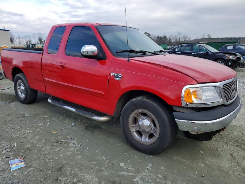 Photo 4 from auction – 2000 FORD F150 with VIN 1FTRX17W5YNB03674