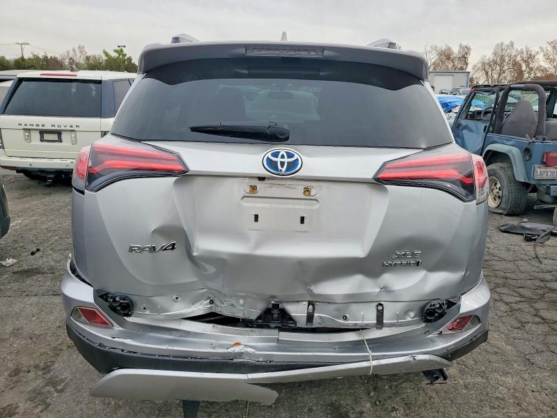 Photo 6 from auction – 2016 TOYOTA RAV4 HV with VIN JTMRJREV5GD006957