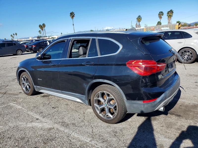 Photo 2 from auction – 2017 BMW X1 with VIN WBXHU7C35H5H34238