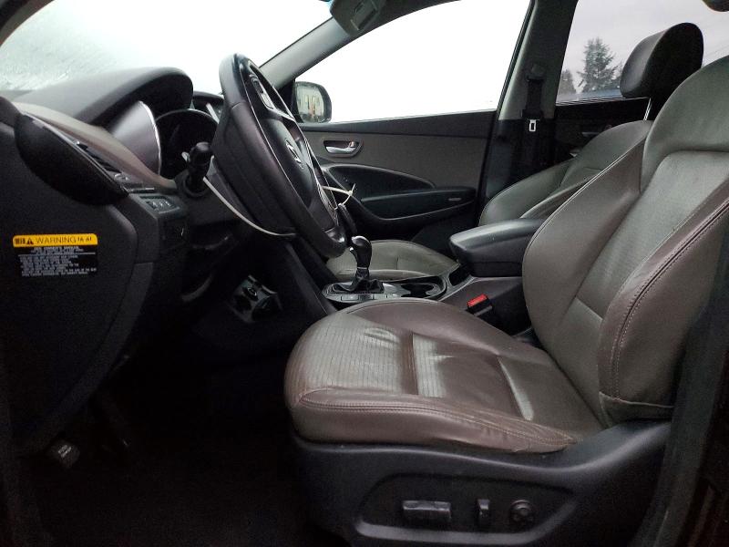 Photo 7 from auction – 2014 HYUNDAI SANTA FE with VIN KM8SN4HF5EU050978