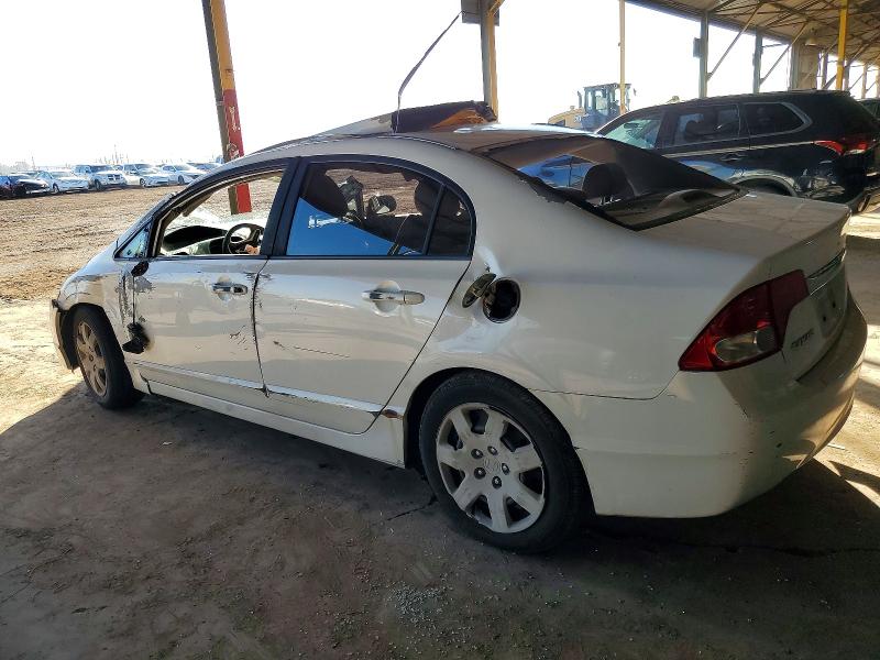 Photo 2 from auction – 2011 HONDA CIVIC LX with VIN 19XFA1F56BE040013
