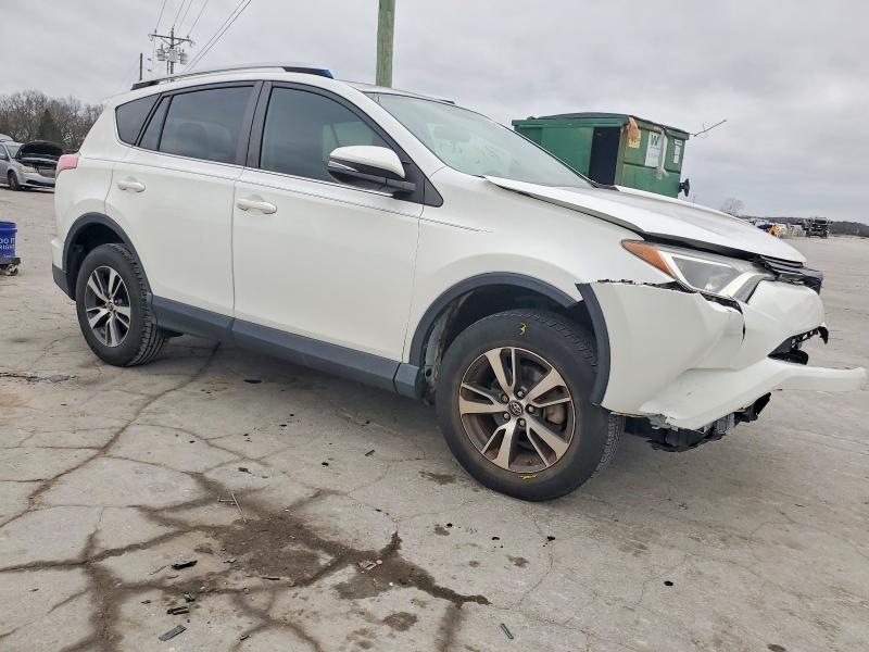 Photo 4 from auction – 2016 TOYOTA RAV4 with VIN JTMWFREV1GJ092046