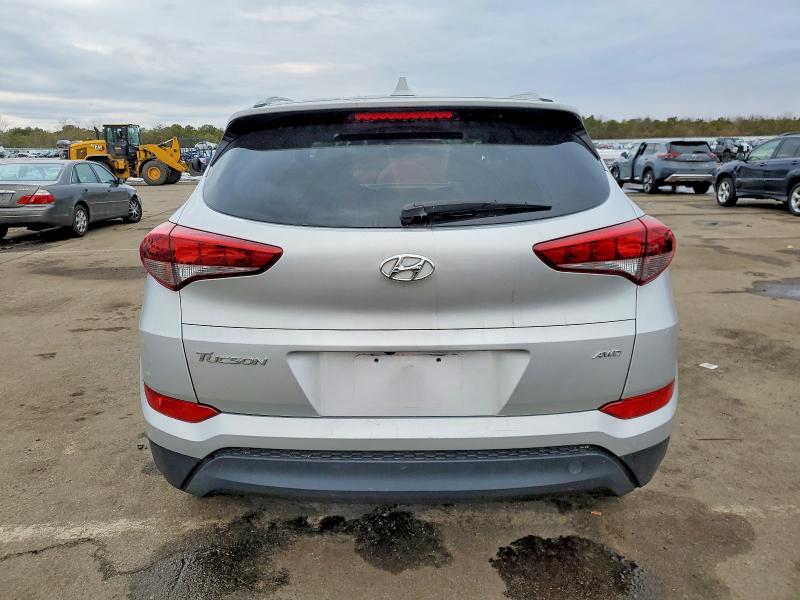 Photo 6 from auction – 2018 HYUNDAI TUCSON SEL with VIN KM8J3CA40JU639743