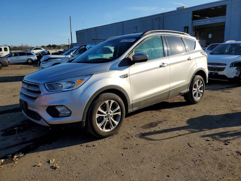 FORD ESCAPE SE 2018 with VIN 1FMCU9GDXJUB98302 - Photo from auction
