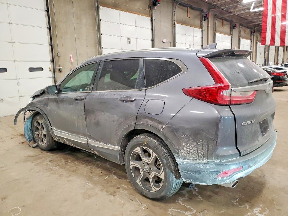 Photo 2 from auction – 2017 HONDA CR-V with VIN 5J6RW2H94HL011978