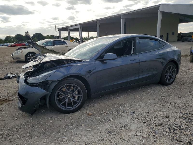 TESLA MODEL 3 2023 with VIN 5YJ3E1EA5PF395746 - Photo from auction