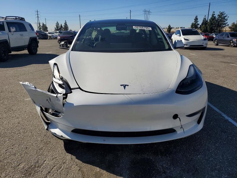 Photo 11 from auction – 2023 TESLA MODEL 3 with VIN 5YJ3E1EA0PF706712