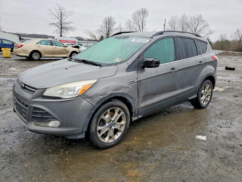 صورة رقم 1 من المزاد - 2014 FORD ESCAPE مع VIN 1FMCU9GXXEUD07034