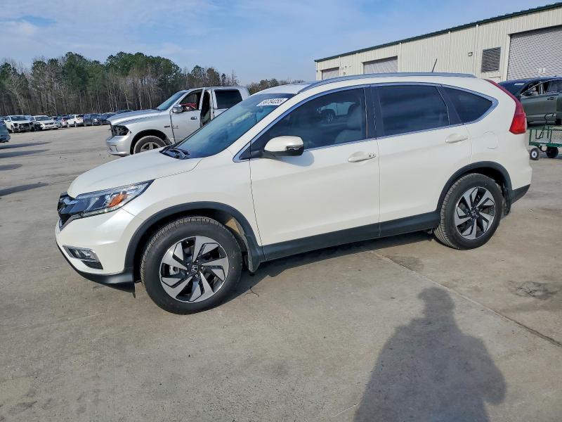 HONDA CR-V TOURI 2016 with VIN 5J6RM3H90GL019053 - Photo from auction