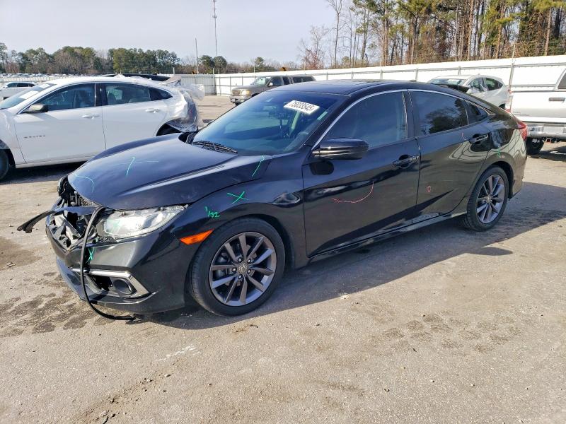 HONDA CIVIC 2021 with VIN 2HGFC1F31MH701075 - Photo from auction