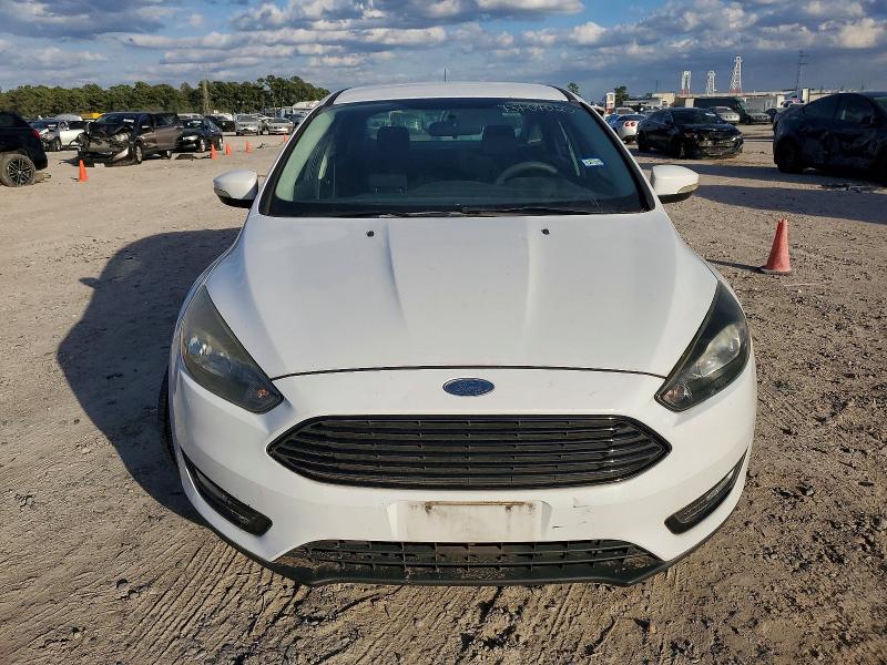 Photo 5 from auction – 2017 FORD FOCUS with VIN 1FADP3FE7HL276502