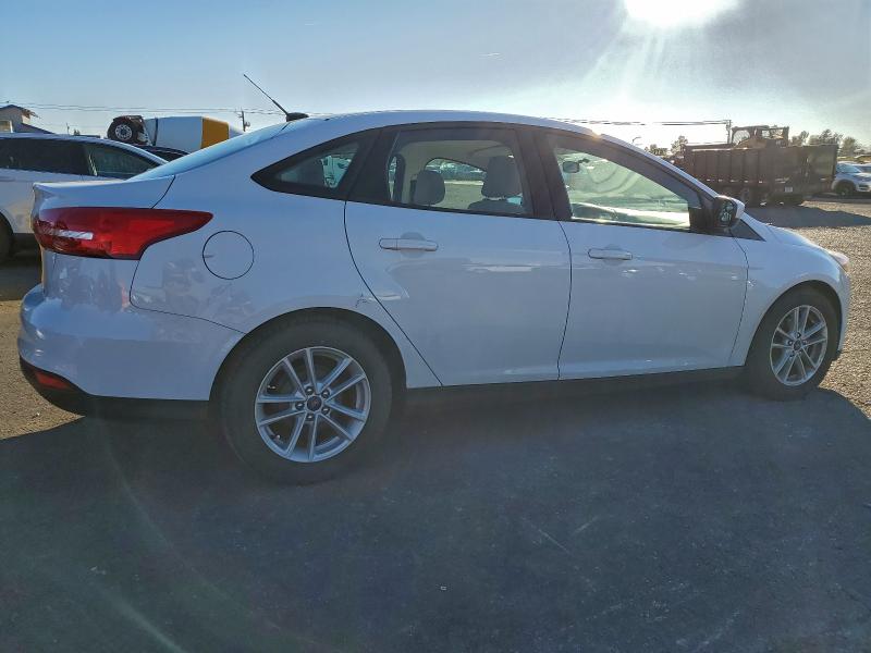 Photo 3 from auction – 2018 FORD FOCUS SE with VIN 1FADP3F23JL230659