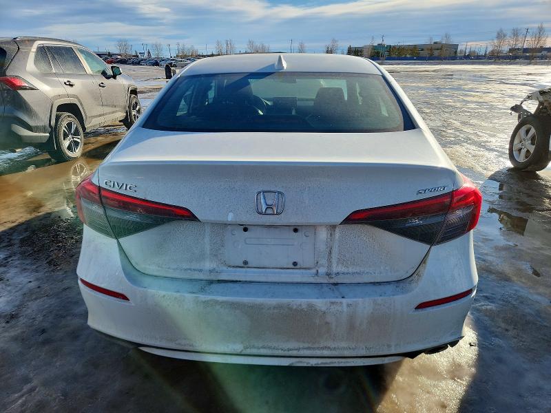 Photo 6 from auction – 2022 HONDA CIVIC SPOR with VIN 2HGFE2F58NH130803