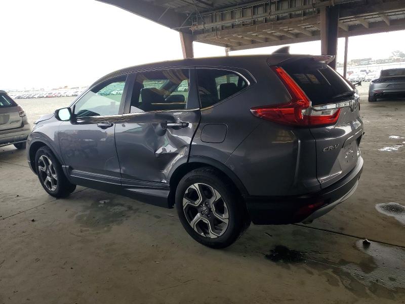 Photo 2 from auction – 2018 HONDA CR-V with VIN 7FARW1H87JE034210