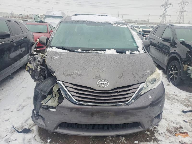 Photo 5 from auction – 2015 TOYOTA SIENNA LE with VIN 5TDKK3DC8FS604152