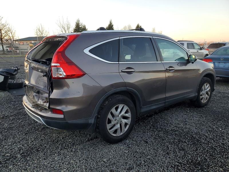 Photo 3 from auction – 2015 HONDA CR-V EXL with VIN 2HKRM4H74FH610080