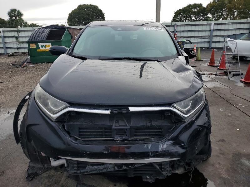 Photo 5 from auction – 2018 HONDA CR-V with VIN 7FARW1H53JE007754