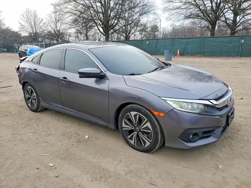 Photo 4 from auction – 2016 HONDA CIVIC with VIN 2HGFC1F30GH634425
