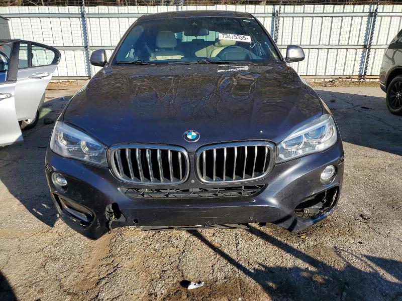 Photo 5 from auction – 2019 BMW X6 SDRIVE3 with VIN 5UXKU0C55K0S97708