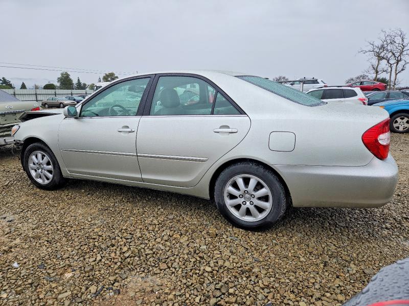Photo 2 from auction – 2002 TOYOTA CAMRY LE with VIN JTDBE30K320056403