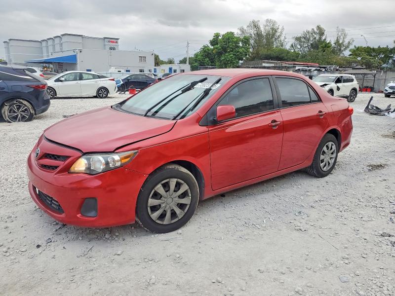 TOYOTA COROLLA 2011 with VIN 2T1BU4EE0BC599189 - Photo from auction