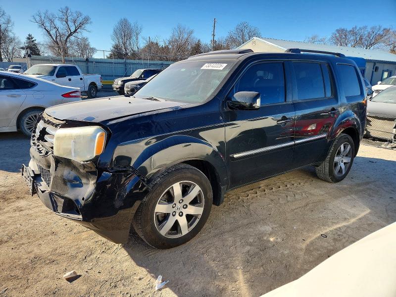 HONDA PILOT TOUR 2014 with VIN 5FNYF4H99EB017867 - Photo from auction