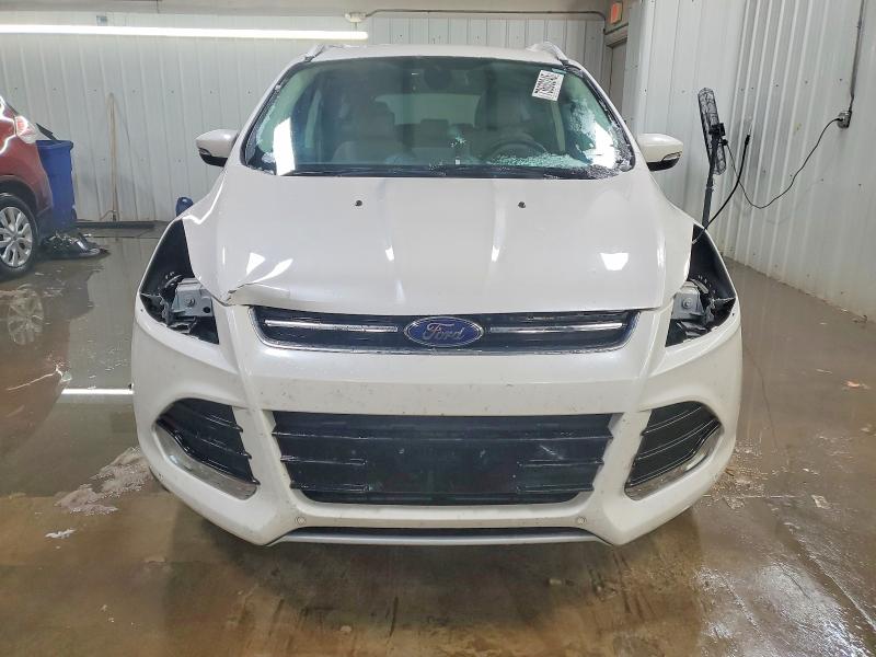 Photo 5 from auction – 2016 FORD ESCAPE TIT with VIN 1FMCU0JX2GUB13993